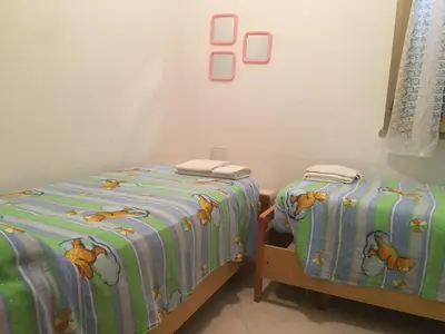 Letto o letti in una camera di Comodissima Casa al Mare 200 mt dalla spiaggia