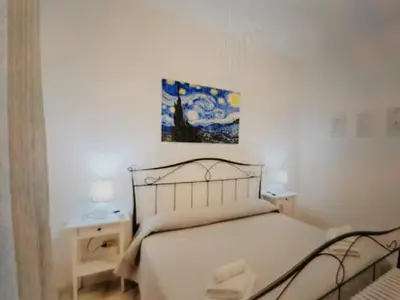 Letto o letti in una camera di Bellissimo e molto comodo