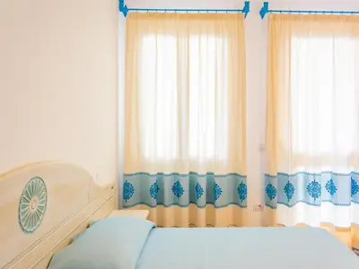 Letto o letti in una camera di Comfortable accommodation in Orosei
