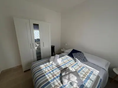 Letto o letti in una camera di Lilly House