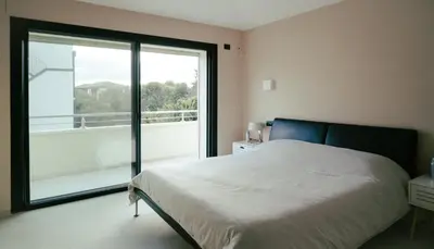 Letto o letti in una camera di villa PAOLA