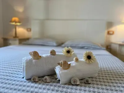 Letto o letti in una camera di Casa Vacanza Lory