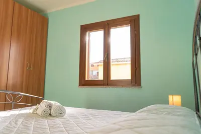 Letto o letti in una camera di Tulipano
