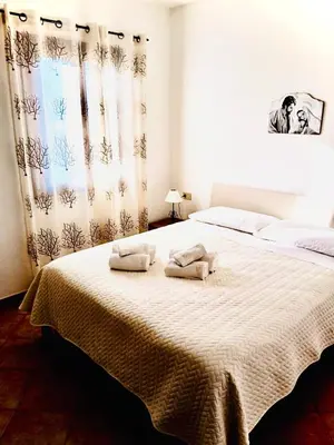 Letto o letti in una camera di Casa Zia Sa'