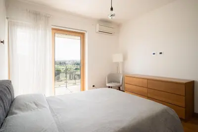 Letto o letti in una camera di Gimber Lofts by Klodge