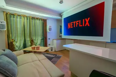 TV o dispositivi per l'intrattenimento presso OlbiAmare Appartamento di Lusso
