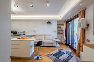 Cucina o angolo cottura di OlbiAmare Appartamento di Lusso