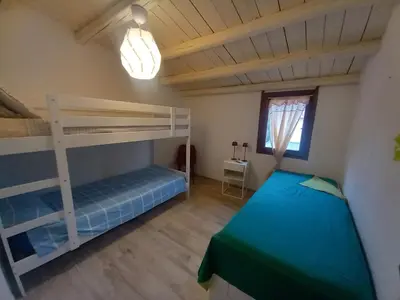 Letto o letti in una camera di Perla marina San Teodoro