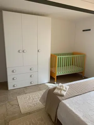 Letto o letti in una camera di Casa Nerelie'S