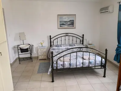 Letto o letti in una camera di Villa L'Oleandro