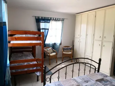 Letto o letti in una camera di Villa L'Oleandro