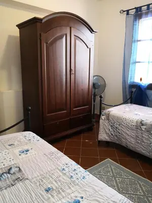 Letto o letti in una camera di Villa L'Oleandro