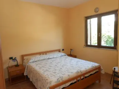 Letto o letti in una camera di Casa vacanze Villa Rosa