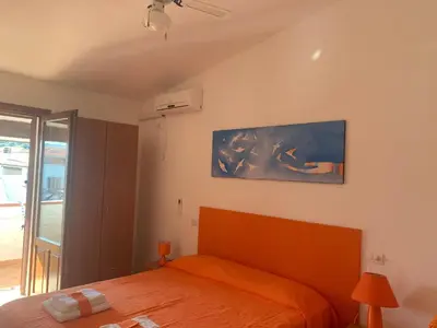 Letto o letti in una camera di Locanda FarOrientale