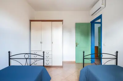 Letto o letti in una camera di Vecchio Stazzo