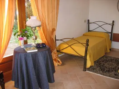 Letto o letti in una camera di S'Arenarju