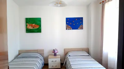 Letto o letti in una camera di Mare&Monti