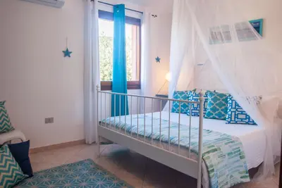 Letto o letti in una camera di Casa Danilo