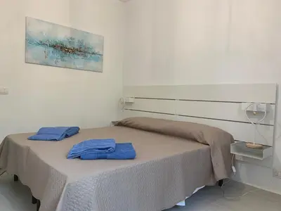 Letto o letti in una camera di Bona Ciurrata