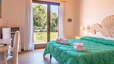 Letto o letti in una camera di QUADRIFOGLIO Affittacamere