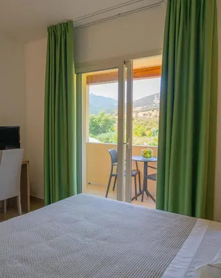 Letto o letti in una camera di Hotel San Teodoro