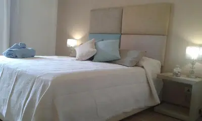 Letto o letti in una camera di Il giardino di Daniela