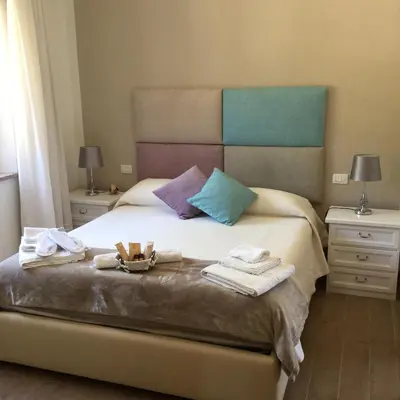 Letto o letti in una camera di Il giardino di Daniela