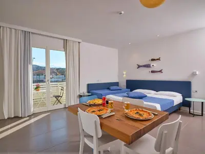 Letto o letti in una camera di Felix Hotels - Hotel Residence Porto San Paolo