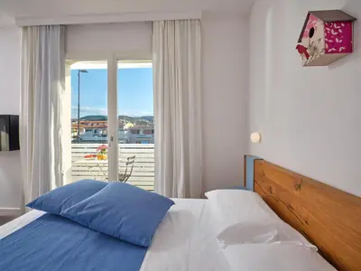 Letto o letti in una camera di Felix Hotels - Hotel Residence Porto San Paolo