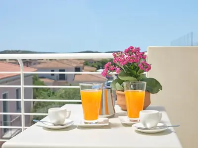 Balcone o terrazza di Felix Hotels - Hotel Residence Porto San Paolo