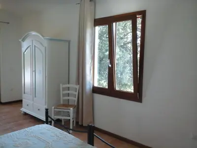 Letto o letti in una camera di Santu Paulu Country House