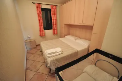 Letto o letti in una camera di Villette Via Carbonia