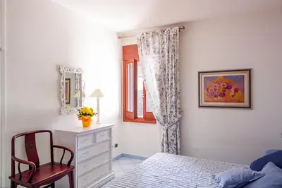 Letto o letti in una camera di Orosei Home Holidays - Rimediu