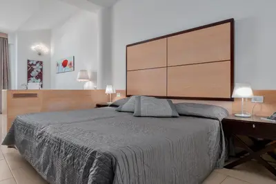 Letto o letti in una camera di The Pelican Beach Resort & SPA - Adults Only