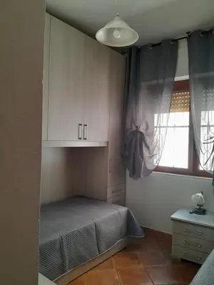 Letto o letti in una camera di Casa Pina