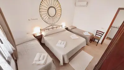 Letto o letti in una camera di Le Sughere
