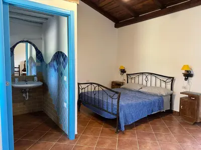 Letto o letti in una camera di Tentadore