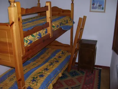 Letto o letti in una camera di Antica Casa dei Contadini di Orosei