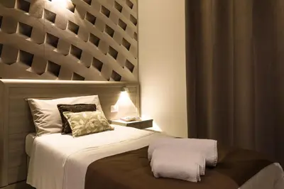 Letto o letti in una camera di La Piazzetta Guest House