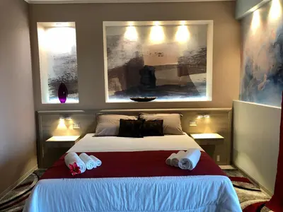 Letto o letti in una camera di La Piazzetta Guest House