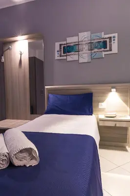 Letto o letti in una camera di La Piazzetta Guest House