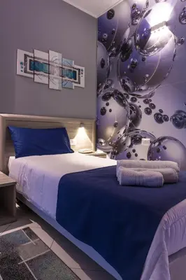 Letto o letti in una camera di La Piazzetta Guest House