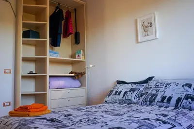 Letto o letti in una camera di Camera vista mare, ingresso indipendente in