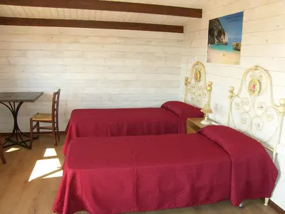 Letto o letti in una camera di Agriturismo Su Nuragheddu