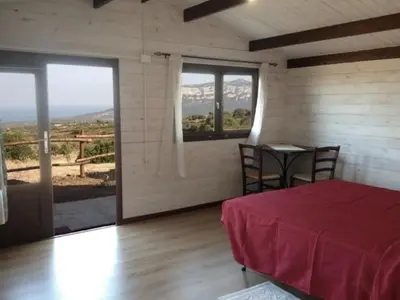 Letto o letti in una camera di Agriturismo Su Nuragheddu
