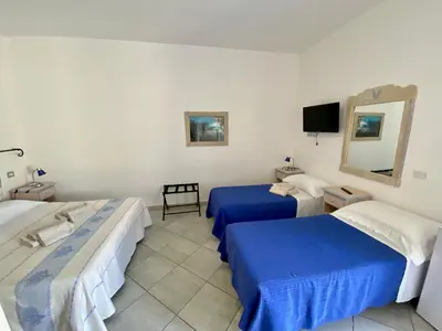Letto o letti in una camera di Tigrillo Bed&Breakfast
