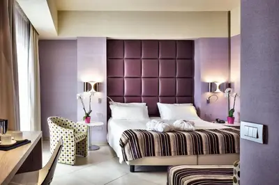 Letto o letti in una camera di Jazz Hotel