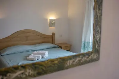 Letto o letti in una camera di Gorropu Hotel