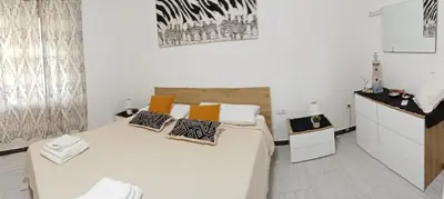 Letto o letti in una camera di La Rosa dei Venti