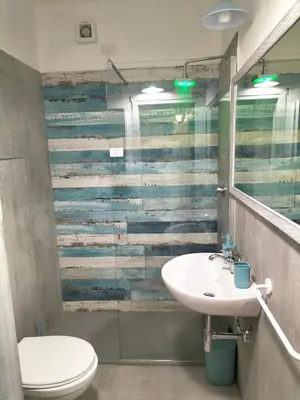 Bagno di BUDONI MARE, Parcheggio e WIFI gratis